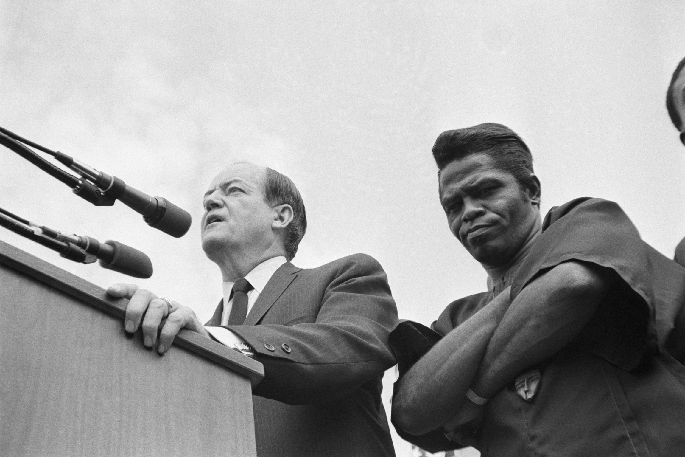 Vice President Hubert H. Humphrey is joined by James Brown as Humphrey addressed hundreds of youth in the Watts Labor Community Action Committee’s summer program, Los Angeles, July 29, 1968. Photo via Bettmann/Getty Images.